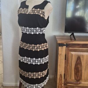 Katherine Kelly, Black Dress with Embroidery Tan & White Accents